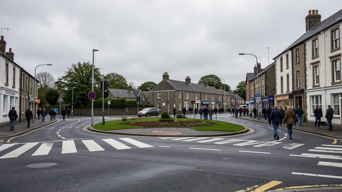A busy road junction in Penrith town centre with pedestrian crossings, awaiting improvements.
